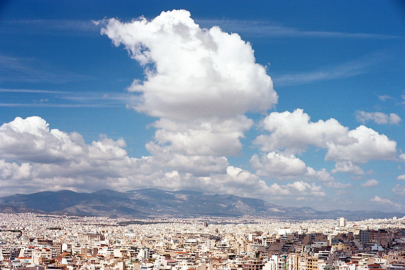 athens panoramic view from the acropolis with clouds and blue sky