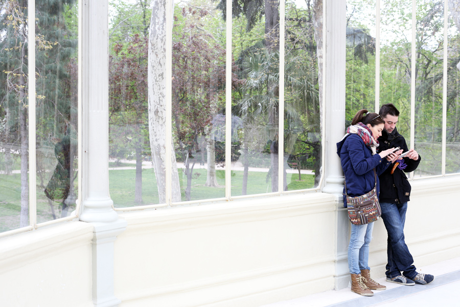 tourists weekend in madrid parque retiro park